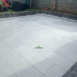 Granite Slabbed Patio with Charcoal Borderline and Connemara Walling in Killinierin, Co. Wexford (6)