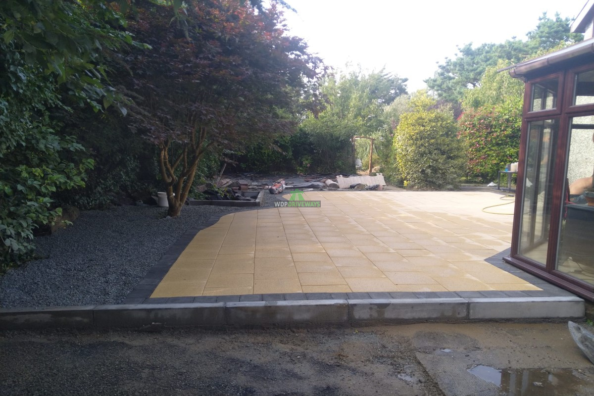 Patio with Granite Slabs, Charcoal Edge and Gravel in FethardonSea